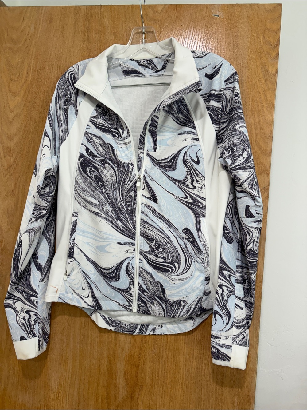 Athleta Marble-Print Zip Jacket in White, Light Blue, and Black